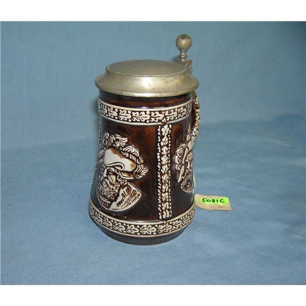 Vintage beer stein with 3 historical figures