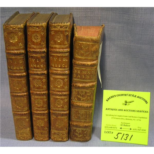 Group of four antique leather bound books