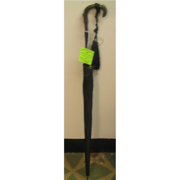 Antique parasol w/ silver handle and hanging tassels