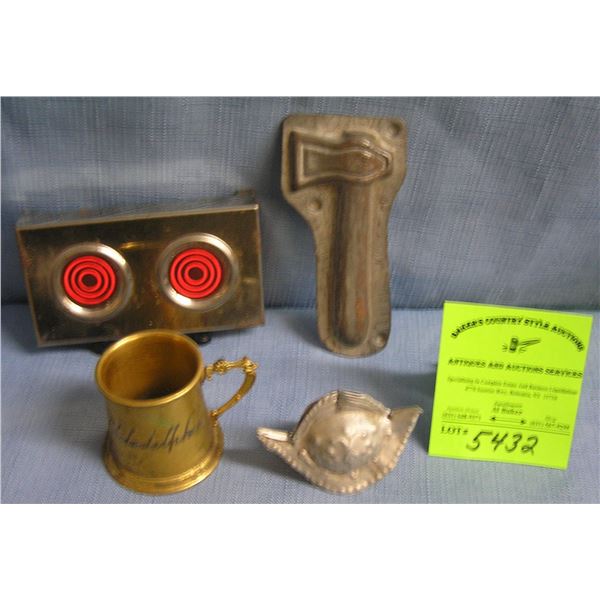 Group of vintage toys, molds, and collectibles