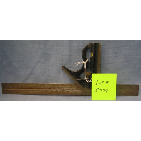 Antique slide rule and level