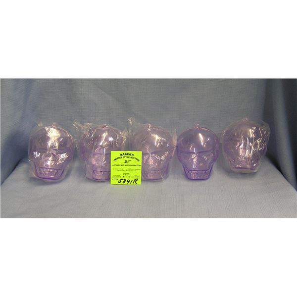 Group of hanging skull candy containers