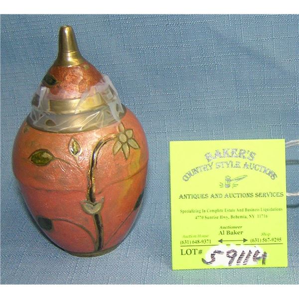 Brass and enameled oriental vase with cover