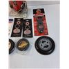 Image 2 : Calgary Flames & Montreal Canadiens Lot: Bottle Opener, Hockey Pucks, Key, Jersey Can Holder, Misc
