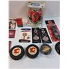 Image 3 : Calgary Flames & Montreal Canadiens Lot: Bottle Opener, Hockey Pucks, Key, Jersey Can Holder, Misc