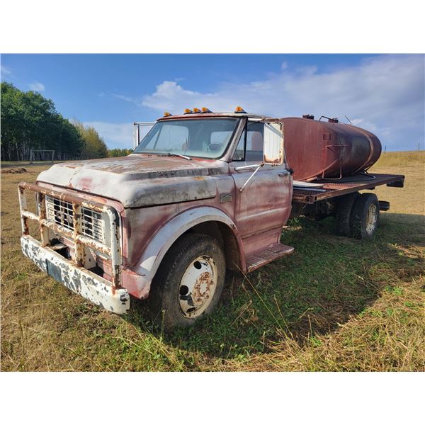 1967 GMC 950, single axle, 6 cyl. Engine, 4 spd trans, PTO, c/w flat deck, 700-gal 2-comp. water tan