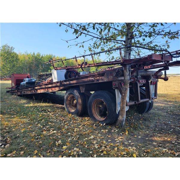 Fruehauf tandem axle oil field float trailer, approx. 40 ft, live roll, 11x24.5 tires, poor conditio