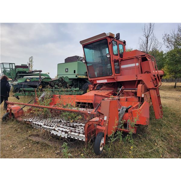 White Cockshutt 5542 combine, sold for parts
