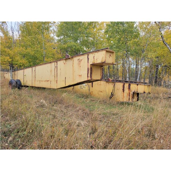 Approx. 60 ft long overhead bridge crane beams, originally out of oil sands in Fort McMurray, heavil