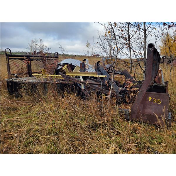 Pulpwood truck deck c/w cat winch, large elec. Motor, several 5th wheels, & misc. scrap, grader, bla