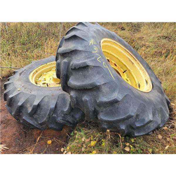 2- Approx. 30-inch hubs c/w rims, came off a JD 3020