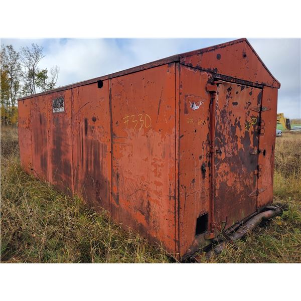 Skidded steel building c/w approx. 3500-gal steel tank, approx. 20 ft x 8 ft