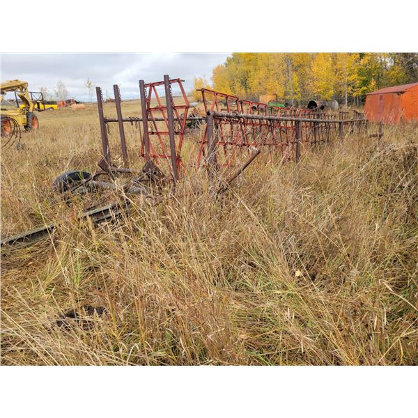 Approx. 66 ft custom built harrow draw bar, missing 4- harrows