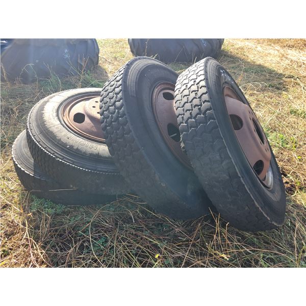 4- 8.25 x20 tires on 10-stud rims