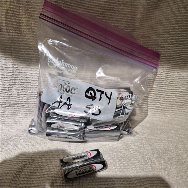 BAG OF 50 NEW UNIVERSAL AA BATTERIES (MFG DATE 2023)