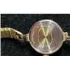Image 3 : VINTAGE BULOVA QUARTZ A2 STAINLESS STEEL BACK CARAVEL ANALOG GOLD TONE EXPANSION WRIST WATCH