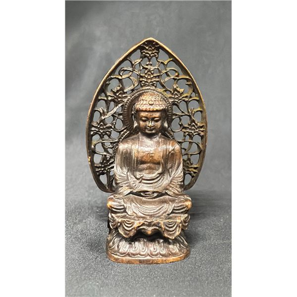 A COPPER FIGURE OF GAUTAMA BUDDHA
