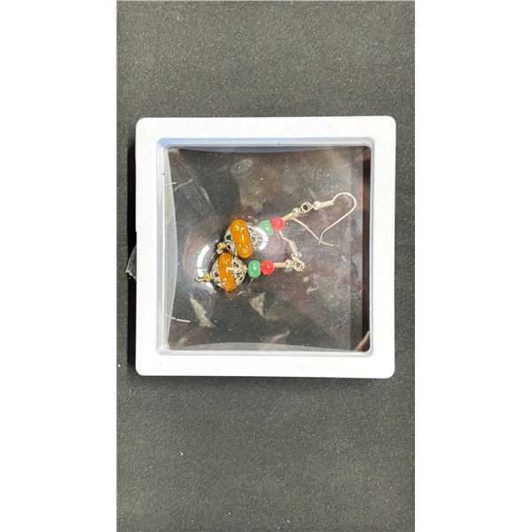 A PAIR OF SINO-TIBETAN BEESWAX EARRINGS