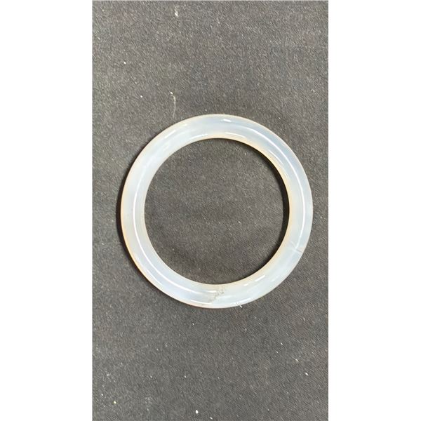 A CELADON WHITE AGATE BANGLE