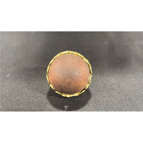 A SINO-TIBETAN HORN BEAD RING