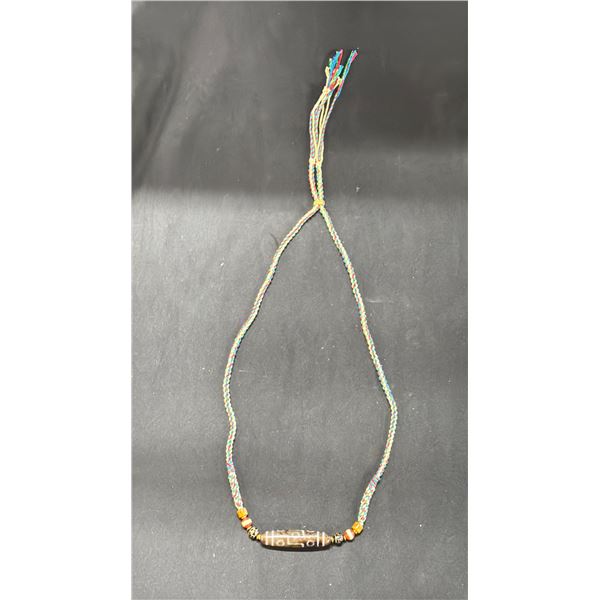 A SINO TIBETAN CEREMONIAL DZI BEAD NECKLACE