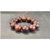 Image 2 : A PURPLE TAN WOOD BRACELET