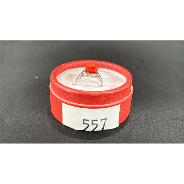 A JAPANESE RED CORAL FLOWER RING IN CASE