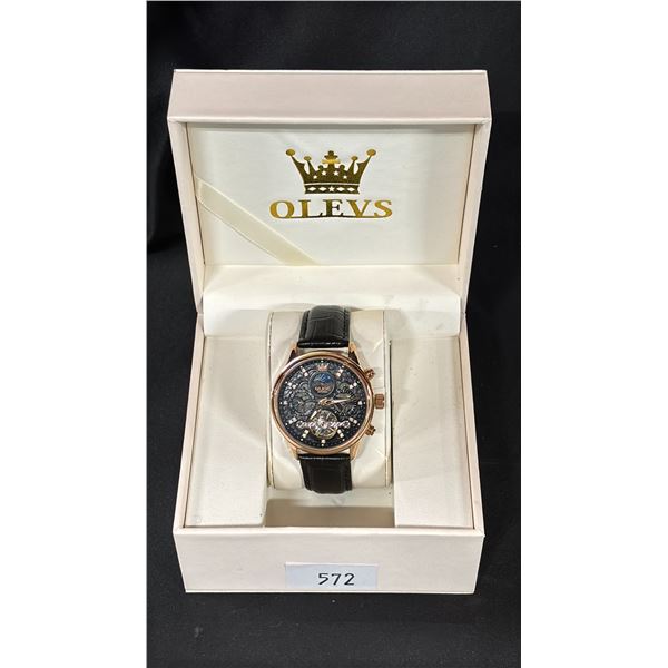 A MECHANICAL SELF-WINDING MENS WATCH