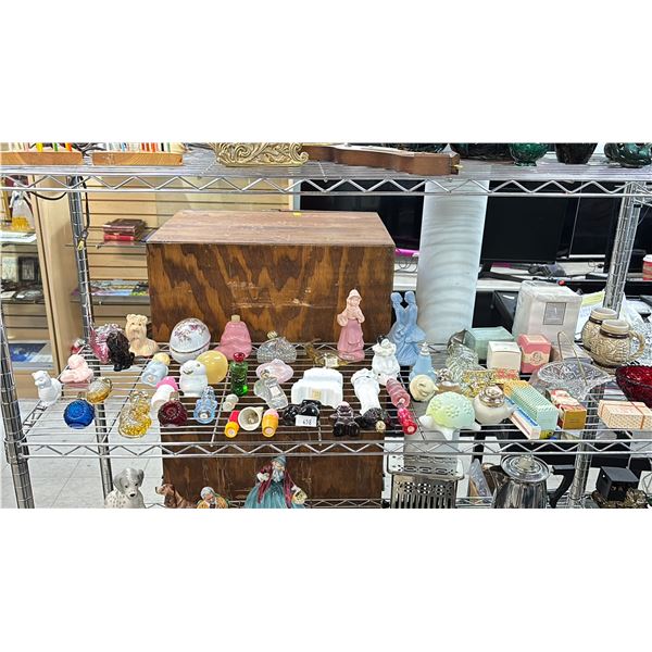 SHELF OF VARIOUS AVON PERFUME/COLOGNE BOTTLES