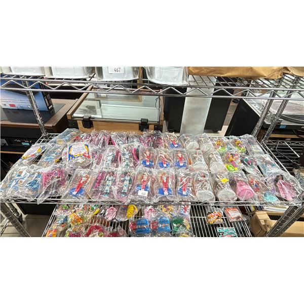 SHELF OF MCDONALDS HAPPY MEAL VINTAGE BARBIES