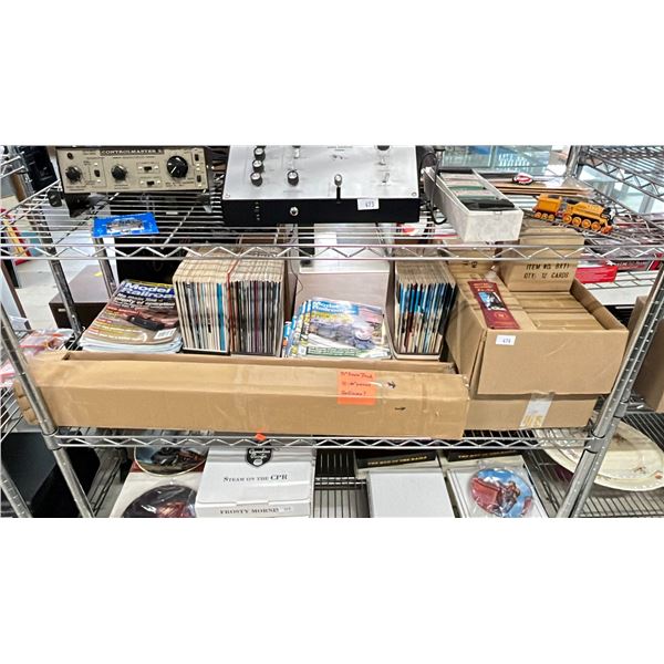 SHELF OF MODEL TRAIN LITERATURE, BOX OF O SCALE MODEL TRAIN TRACKS & BOX OF TRAINS CANADA