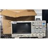 Image 1 : SIGLENT SDS 1104X-E DIGITAL STORAGE OSCILLOSCOPE WITH POWER CORD AND MANUAL