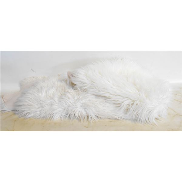 2 FAUX FUR RUGS APROX24 X30 