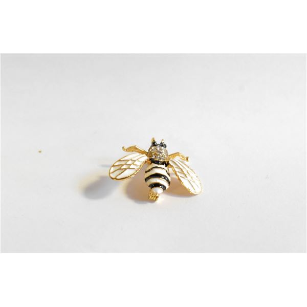 22)  GOLD TONE WITH WHITE & BLACK ENAMEL