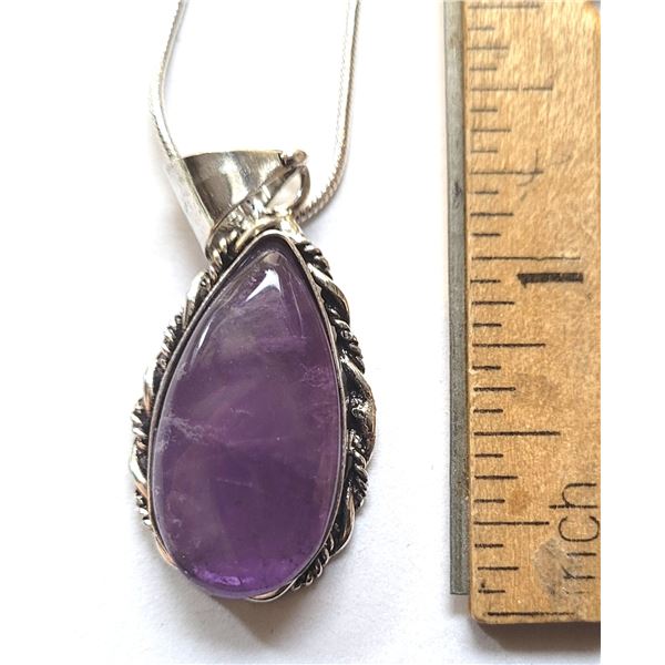 15)  NATURAL PEAR SHAPED AMETHYST