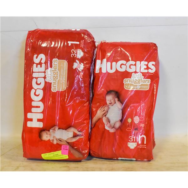2 NEW PACKAGE DIAPERS NB-1 UP TO 14LBS