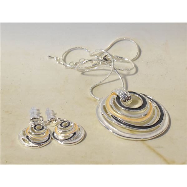 12)  SILVER TONE WITH BLACK, CREAM AND