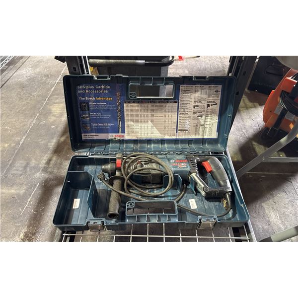BOSCH BULLDOG XTREME VARIABLE SPEED ELECTRIC ROTARY HAMMER IN A HARD TRANSPORT CASE