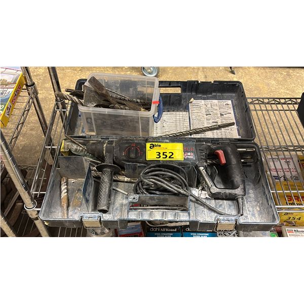 BOSCH BULLDOG XTREME VARIABLE SPEED ELECTRIC ROTARY HAMMER IN A HARD TRANSPORT CASE