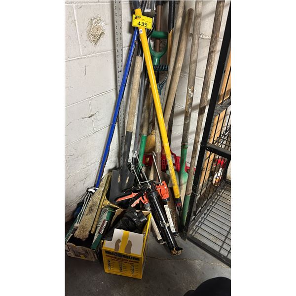 2 BOXES OF GARBAGE BAGS AND ASSORTED GARDEN TOOLS INCLUDING SPADES, RAKES, CULTIVATOR & MORE