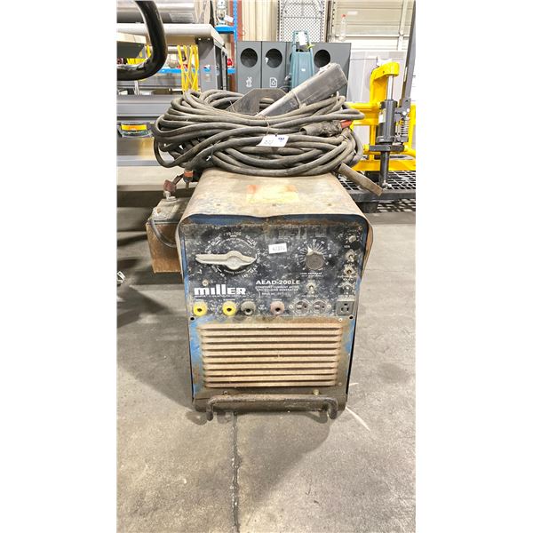 MILLER AEAD-200LE CONSTANT CURRENT AC/DC ARC WELDING GENERATOR WITH GROUND, CABLING, & HOBART RODS