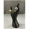 Image 1 : Lot of 2 Gold Tone and Silver Tone Skull Rings