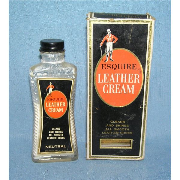 Early Esquire leather cream glass bottle