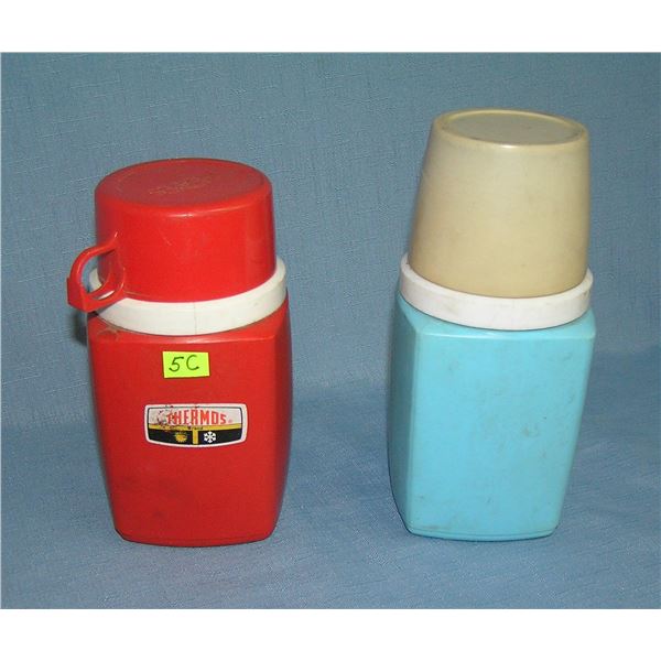 Pair of vintage Thermos bottles