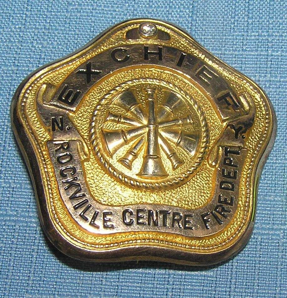 Early gold filled diamond encrusted ex-fire chiefs badge