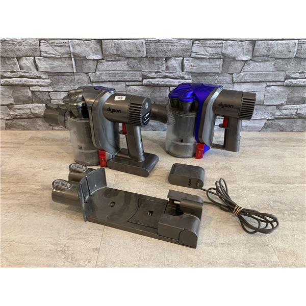 Lot of 2 Dyson Vacums Untested With Battery And Charger