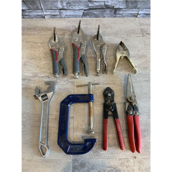 Bag of Assorted Tong Clamps and Tools