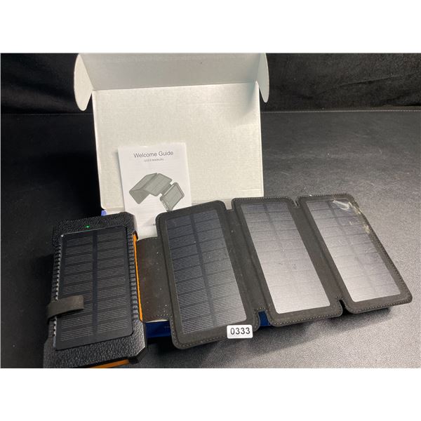 1 High-Capacity 38,800mAh Solar Power Bank w/ 4 Solar Panels (Model: M30000S) - Brand New