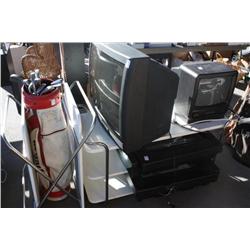 Shelfs With TV's & Golf Clubs