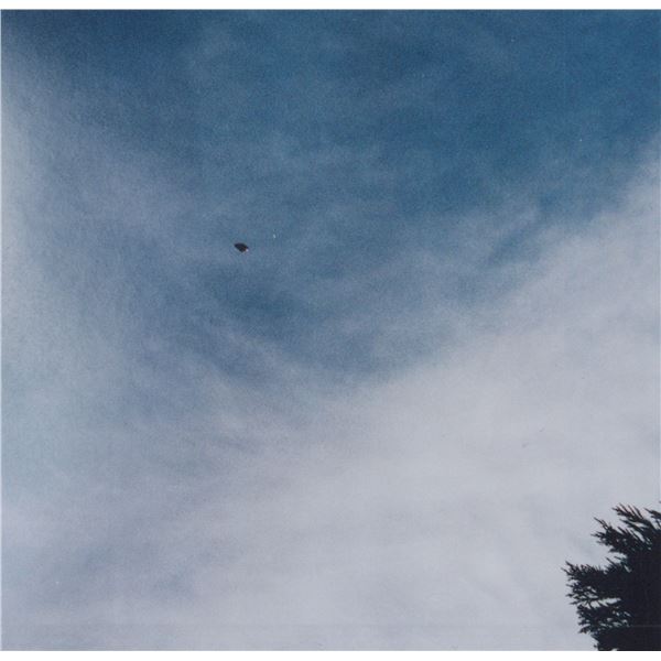 Photograph: UFO in the Clouds - Kawasaki Japan, Nov. 2 1997 - Taken by Junichi Kato